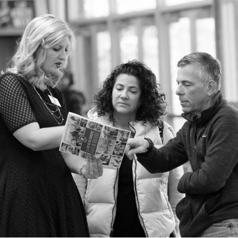 Parents talking to an admissions counselor